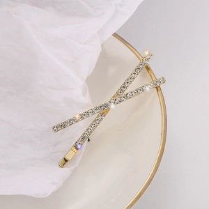 Elegant gold X-shaped cross hair clip with sparkling rhinestones for women hair styling
