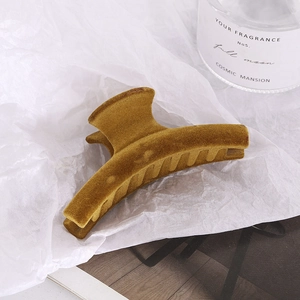 Fashionable velvet flocked geometric hair claw clip in mustard yellow for women