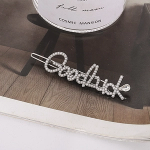 Fermaglio Goodluck argento con perle bianche e cristallo a forma di goccia