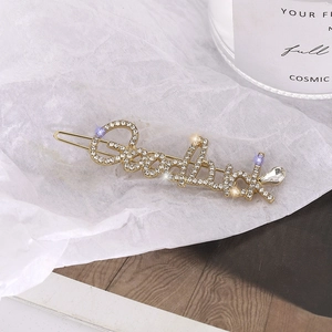 Elegante fermaglio per capelli Goodluck dorato con strass e perle brillanti
