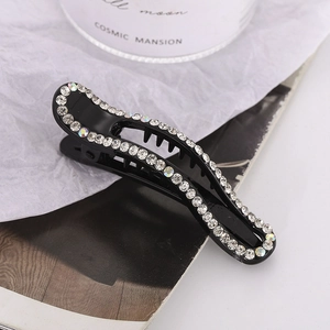 Elegant black duckbill hair clip with sparkling rhinestones for stylish hair styling
