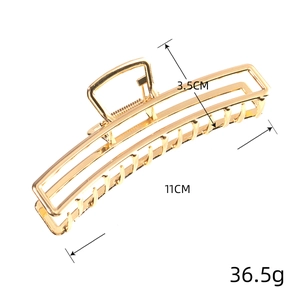 Detailansicht der 11cm goldenen Haarklammer aus Metall mit Maßen und Gewicht