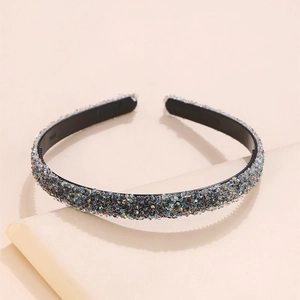 Chic multi-color crystal headband with non-slip teeth on minimalist display