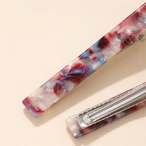 Elegant marble pattern acetate hair clip with silver metal grip for women's hairstyling