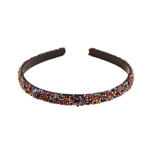 Colorful crystal embellished headband with bohemian style stones on black frame