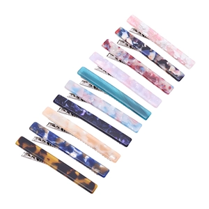 Set of 10 tortoiseshell and marble acetate hair clips with sleek metal duckbill base