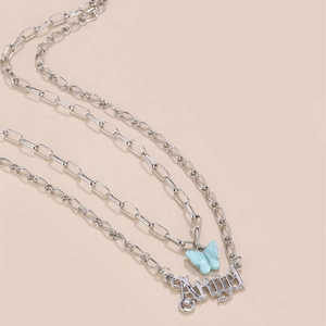 Collana a doppio strato argento con farfalla azzurra e ciondolo lettera Angel