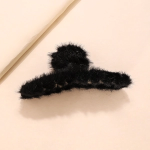 Elegant black faux fur hair claw clip for women featuring a minimalist winter design