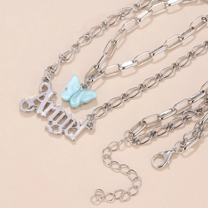Collana doppia in argento con farfalla azzurra e ciondolo con la scritta Angel