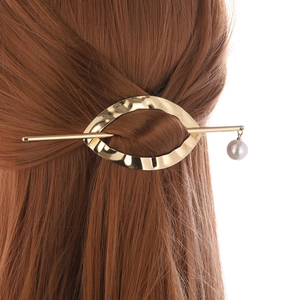Minimalist gold metal hair pin with textured oval ring and elegant pearl drop detail