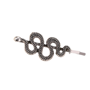 Antique silver snake-shaped hair clip with detailed scales and creative serpent design