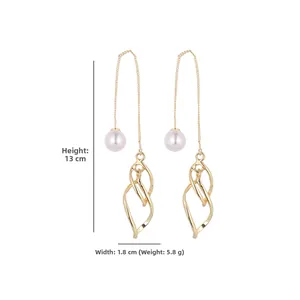 Detail view of pearl drop earrings with gold chain dimensions 13cm height and 1.8cm width