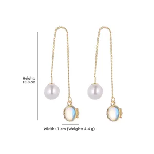 Detail showing dimensions of moon and star pearl drop earrings measuring 10.8 cm in length