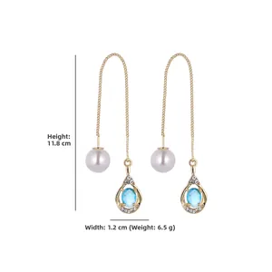 Star moon pearl drop earrings with blue crystal teardrop and gold chain tassels