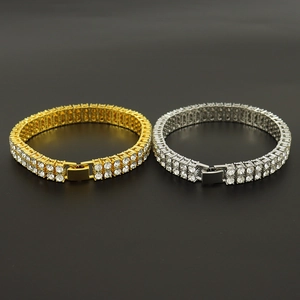 Hip hop style double row tennis bracelet in gold and silver finish with crystal pavé