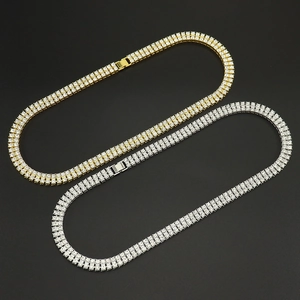 Double row diamond tennis necklace in gold and silver finish on black background