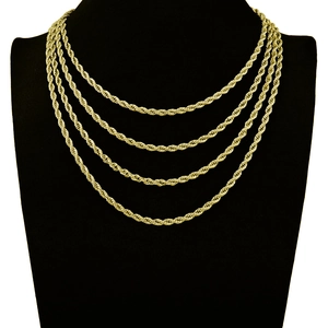 Macro detail of 5mm gold twisted rope chains layered on a black necklace display