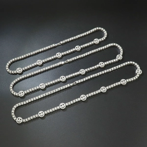Sparkling tennis chain necklace with silver-tone zircon and five smiling face charms