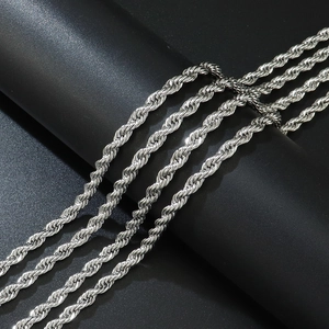 Detailed close-up of 5mm silver stainless steel rope chain with a twisted spiral texture