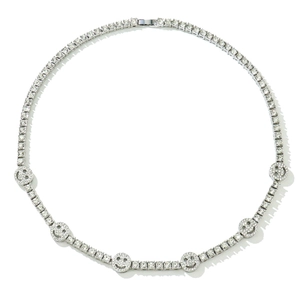 Sparkling silver tennis chain with multiple iced-out smiley face charms and white rhinestones