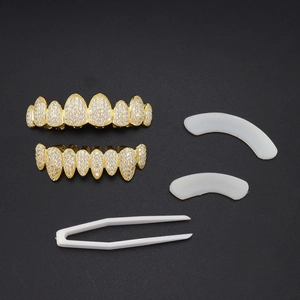 Σετ χρυσά δόντια hip hop grillz με οκτώ δόντια, κυβική ζιρκόνια και ράβδους σιλικόνης