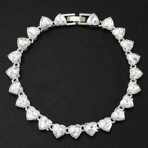Elegant silver heart linked bracelet with shimmering cubic zirconia and fold-over clasp