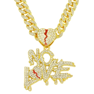 Iced out gold Cuban chain with red broken heart and NO LOVE dripping pendant
