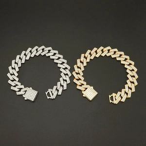 Bracciale Cuban Link 15mm con diamanti incastonati in finiture oro e argento