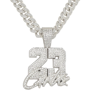 Icy silver Cuban chain necklace with iced-out number 23 pendant in hip hop style