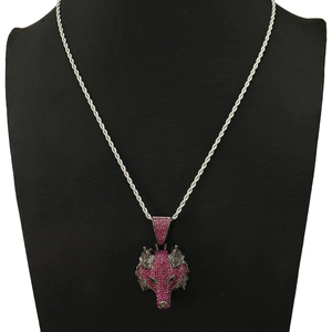 Detailed view of hip hop wolf head pendant with pink rhinestones on twisted rope chain