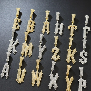 Hip-hop style gothic letter pendant in gold and silver finish with paved zircon stones