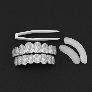 Copper hip-hop grillz set with zircon stones, tweezers, and silicone strips