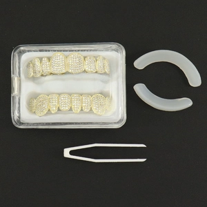 Hip hop gold grillz set with zircon crystals including upper and lower teeth and tools