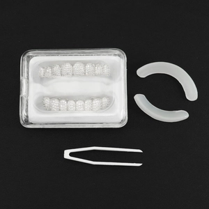 Hip hop silver tooth grillz set with sparkling white zircon stones and essential tools