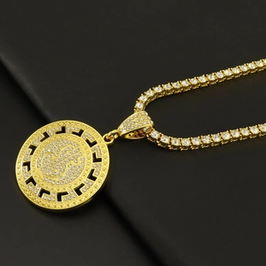 Macro detail of iced out dollar sign pendant on tennis chain over black leather background