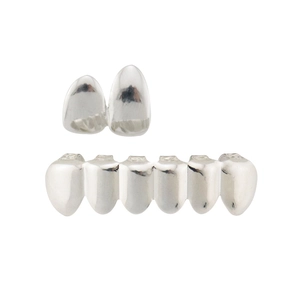 Detailed view of silver hip hop grillz set featuring two-tooth and six-tooth metal designs