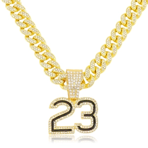 Iced out gold Cuban chain necklace with sparkling crystal encrusted number 23 pendant