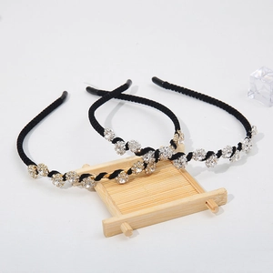 Three-piece black fabric headbands with sparkling rhinestone flower charms for women