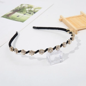 Elegant thin black fabric headband decorated with sparkling rhinestone plum blossoms