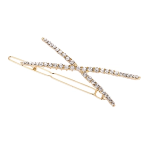X-shaped gold-plated hair clip with sparkling rhinestones for elegant styling