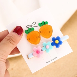 Cute carrot and floral hair clips set on display card for girls and women