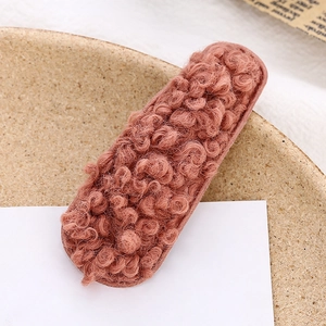 Fermaglio per capelli BB in peluche di lana di agnello rosa con morbida texture