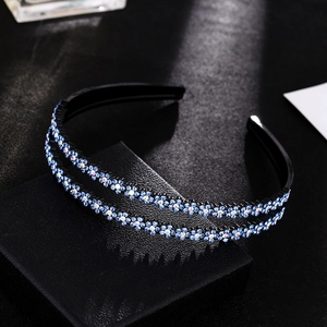 Detail of double-layer plastic headband with blue rhinestone plum blossoms and anti-slip teeth