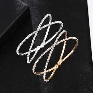 Fashionable crisscross open bangles in gold and silver finish with full crystal pave