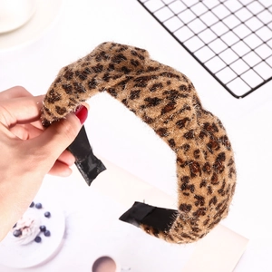 Leopard print headband with silver glitter thread and cross-knot design for women