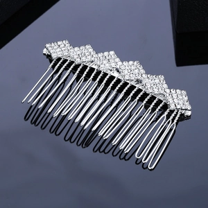 Elegant silver hair comb featuring geometric diamond shapes encrusted with rhinestones