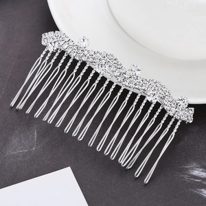 Elegant silver alloy bridal hair comb with wavy rhinestone patterns and pearls for weddings