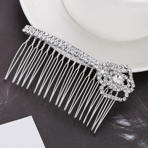 Elegant silver alloy hair comb with rhinestones and a rose design for bridal styling
