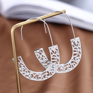 Hollow out geometric U-shaped silver hoop earrings with intricate bohemian patterns