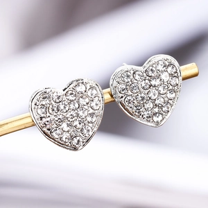 Elegant silver-plated heart stud earrings with sparkling pave-set white crystals